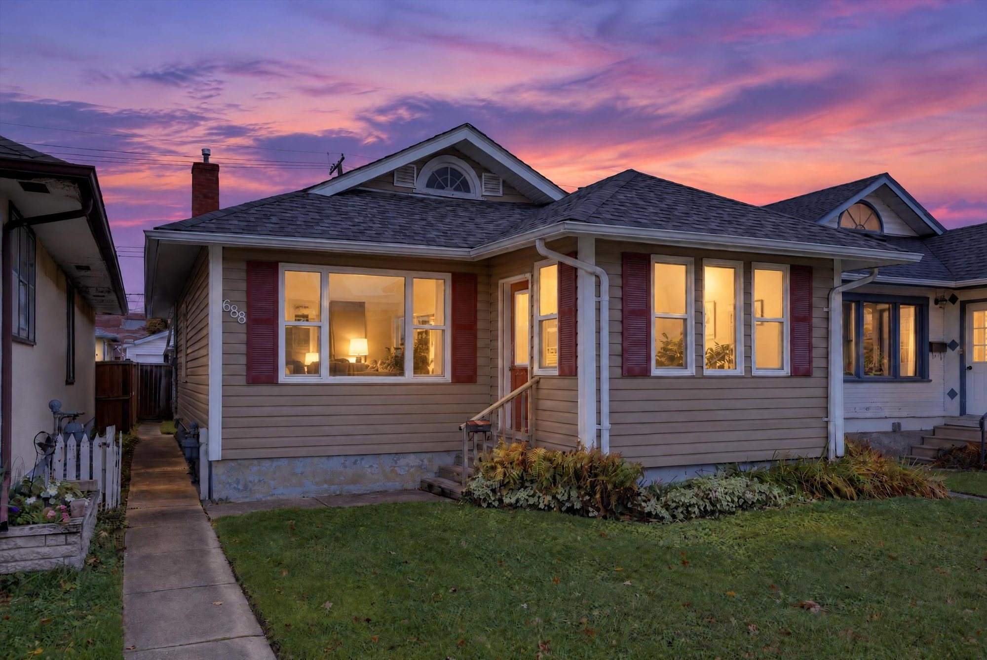 688 Sherburn Street photographed at twilight